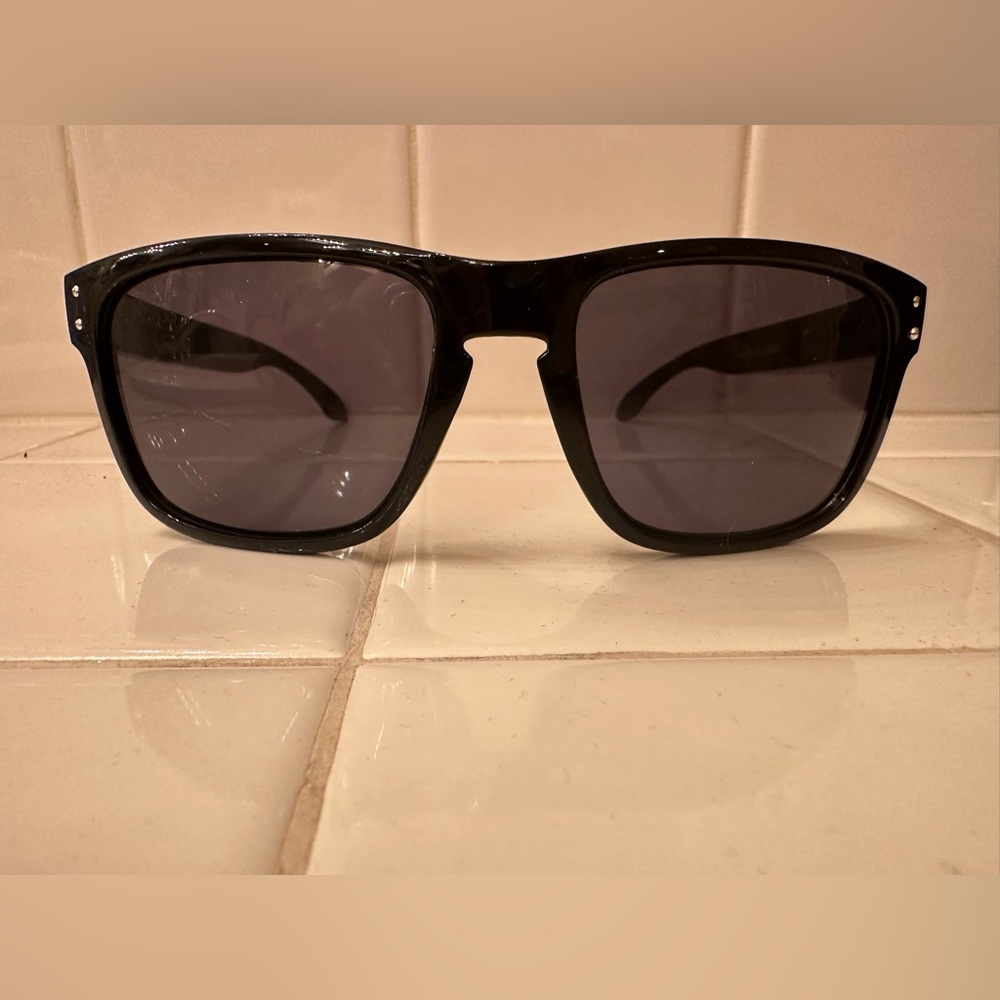 Brand New Oakley Holbrooks, all black with red on the side.